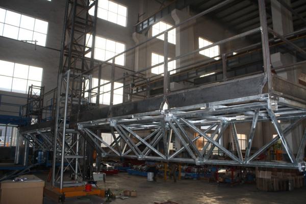 Mast Climbing Aerial Work Platform for Glass Wall Installation