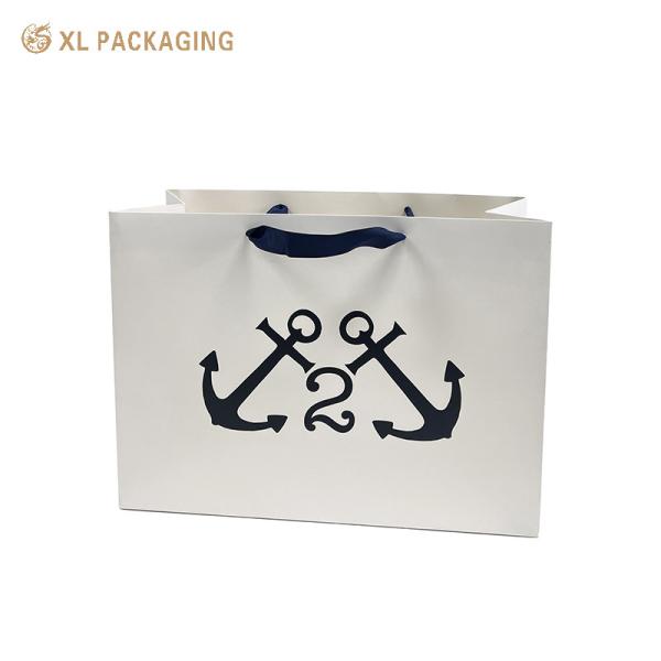XL Packaging Custom Packaging Factory White Paper Packaging Bags Gold Foil Kraft Paper Clothes Shoes Shopping Bag With Handle