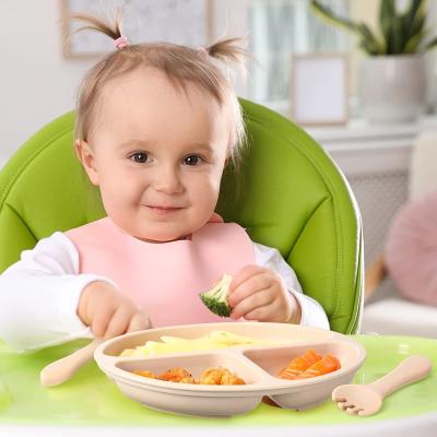 Glissez non le bavoir de alimentation de silicone pratique, les plats des enfants portatifs de silicone