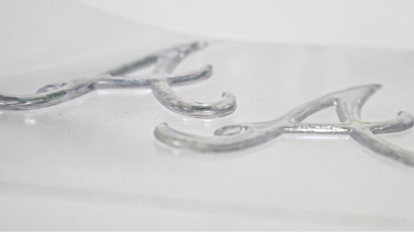 Custom Imitate Ice Semi Transparent Glossy TPU Logo Heat Transfer Badge For Garment