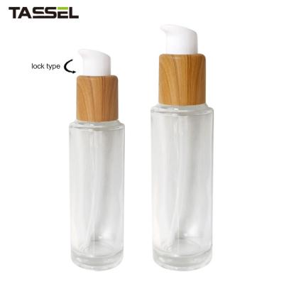 garrafa de vidro do círculo de 30ml 50ml com tipo de madeira do fechamento da bomba do tratamento do efeito