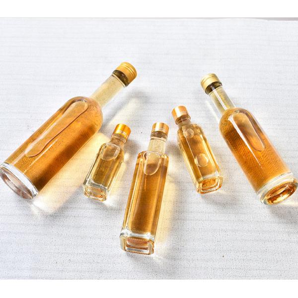 Glass Olive Oil Bottle 100ml 250ml 500ml Round Clear Cooking Oil Bottle with Cap