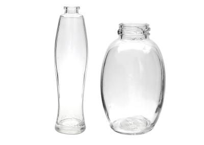 Bouteilles en verre cosmétiques vides claires de salle de bains avec le distributeur de pompe rechargeable
