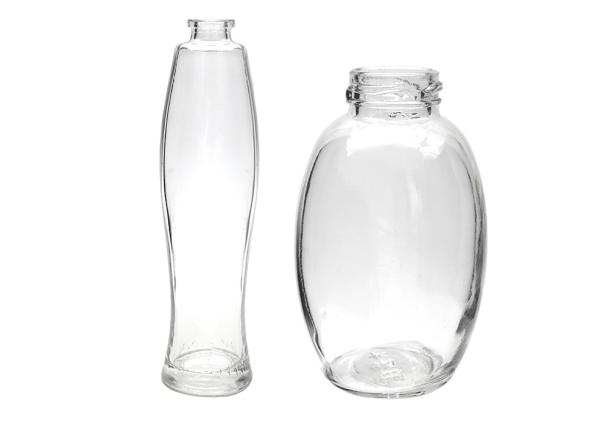 Bouteilles en verre cosmétiques vides claires de salle de bains avec le distributeur de pompe rechargeable