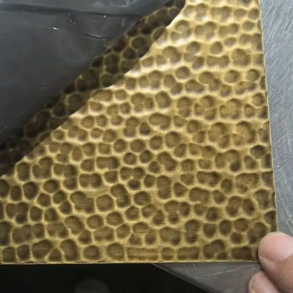 Platos de acero inoxidable martillados a mano con textura única para decoración de arte mural interior