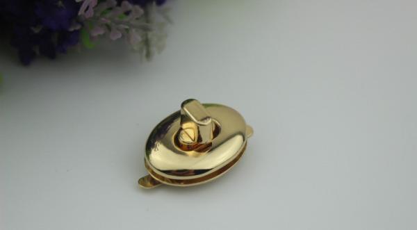 High quality small oval shape metal handbag accessories gold twist turn lock