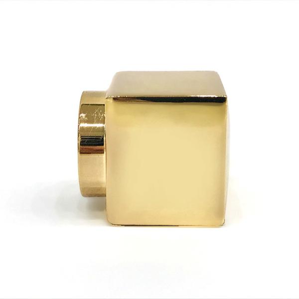 O cubo liga de zinco criativo do ouro dá forma ao metal Zamac perfuma o tampão de garrafa