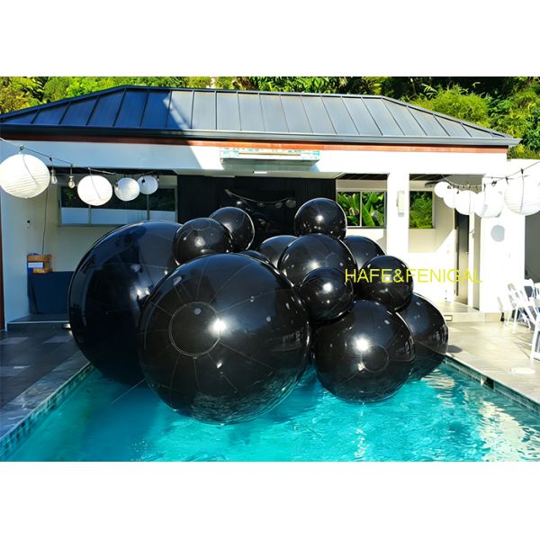 Gold, Black, And Red Inflatable Pvc Mirror Balloons As Water Art Installation