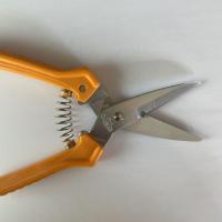 Tijeras multifunción con mango naranja ergonómico