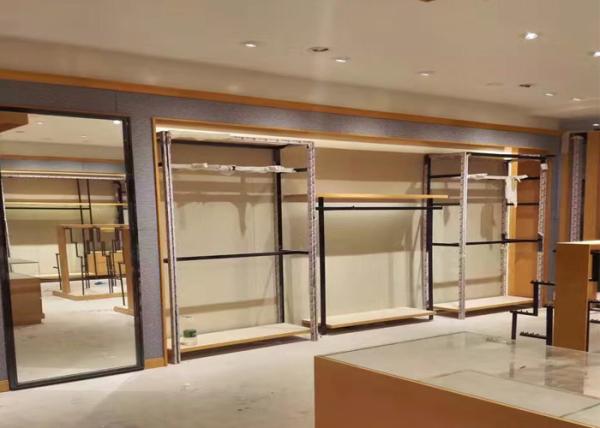 Graceful Wooden And Steel Clothes Display Stand / Retail Clothing Store Fixtures