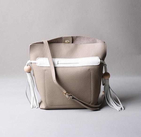 2016 summer new Korean fashion spell color tassel leather handbag drawstring shoulder bag packet header layer of skin