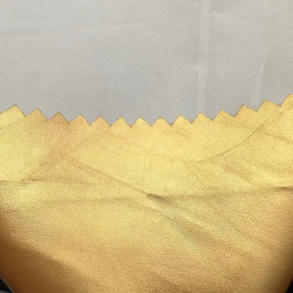 100% Polyester 104GSM Outdoor Jacket Fabric Water Resistant With Gilded Gold Fabric