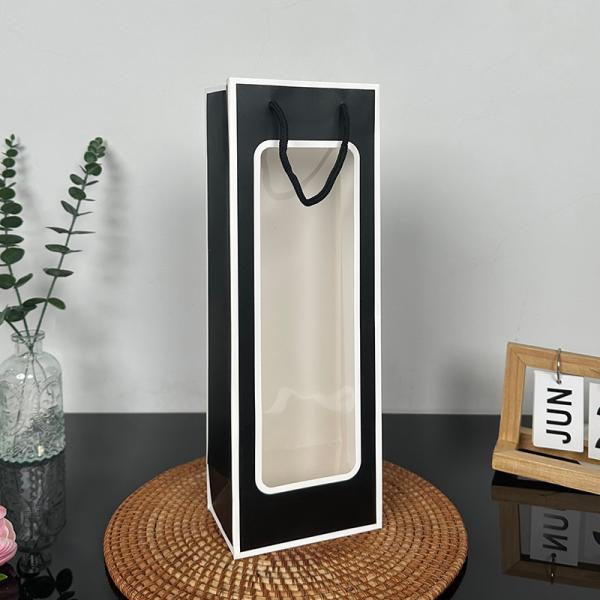 Elegant Black Gift Bags With Clear Window Premium Kraft Paper Hand Carry Bags For Luxury Packaging