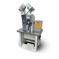 Machine automatique pneumatique de perforation et d'oeillet pour la fabrication de chaussures et de sacs à main