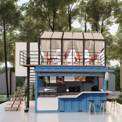 Container de 20 pieds de largeur, de design moderne, en acier, préfabriqué, mobile, maison, café-bar, avec terrasse et application extérieure