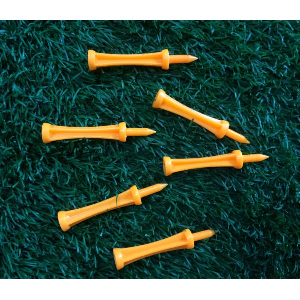 yellow golf tee , golf tees , plastic golf tee