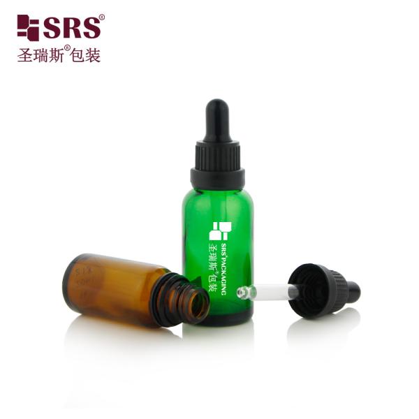D005 Logo imprimé en ambre Impression par écran de soie Noir caoutchouc plastique épaule gouttelier Couvercle Bouteille en verre pour l'essence capillaire