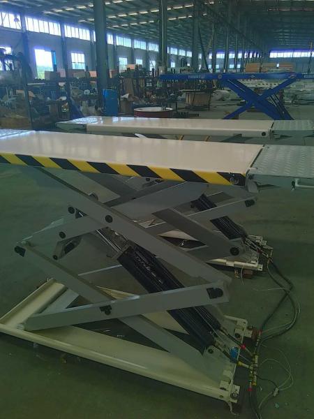 High rise 4 c ylinder on ground mounted car lift with double scissor