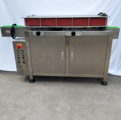 Bottle bottom shrink wrapping machine