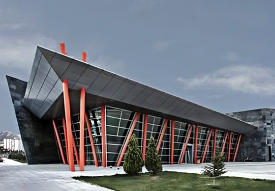 Q235B Q355B ASTM A36 Prefab Steel Frame Building For Warehouse Workshop Custom Design