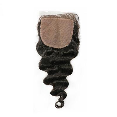 Afrouxe a cor da pele principal natural brandamente lisa de seda do fechamento do cabelo humano da onda