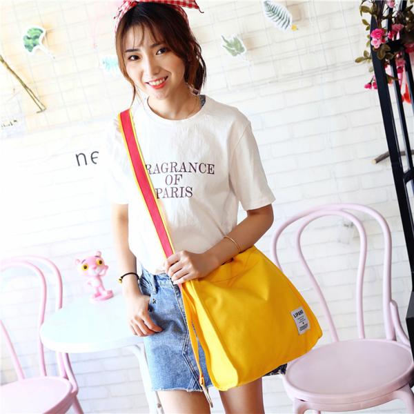 New canvas small ring shoulder Messenger bag simple portable leisure Joker bag women