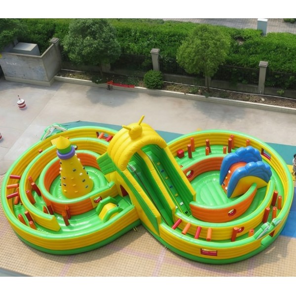 Figure Eight Inflatable Obstacle Course with Central Climbing Wall Slides and Curved Challenge Track