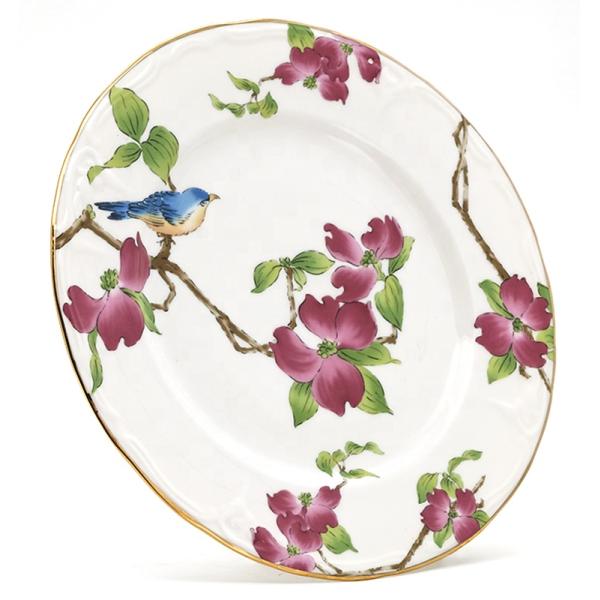 Plato decorativo de cerámica blanca con bordes dorados para la fiesta de bodas