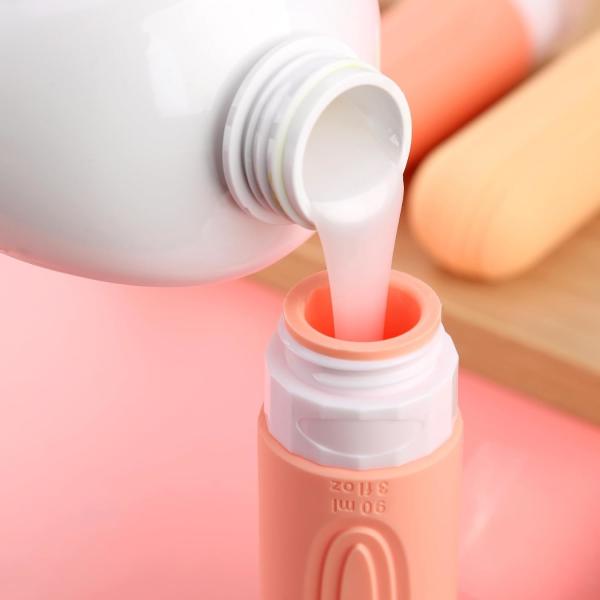Bouteille de voyage en silicone essentiel rose 90 ml pour les articles de toilette