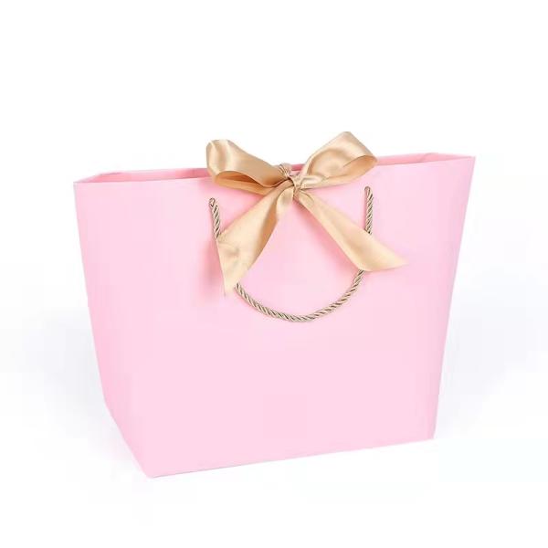 Персонализированный роскошный на заказ ремесла Ручная работа Розовая покрытая художественная бумага Косметика Одежда Ювелирные изделия Подарочные сумки Маленькие