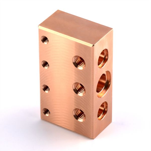 Custom hydraulic valve blocks red copper and brass manifolds, adaptable to various hydraulic equipment