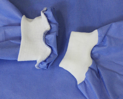 Unisex мантия SMS+PE 53GSM устранимая ультразвуковая соединяя швами со связями