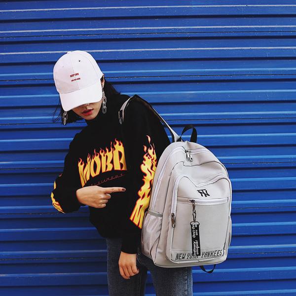 Korean version of cool letters backpack students fashion large capacity schoolbag waterproof casual backpack girl