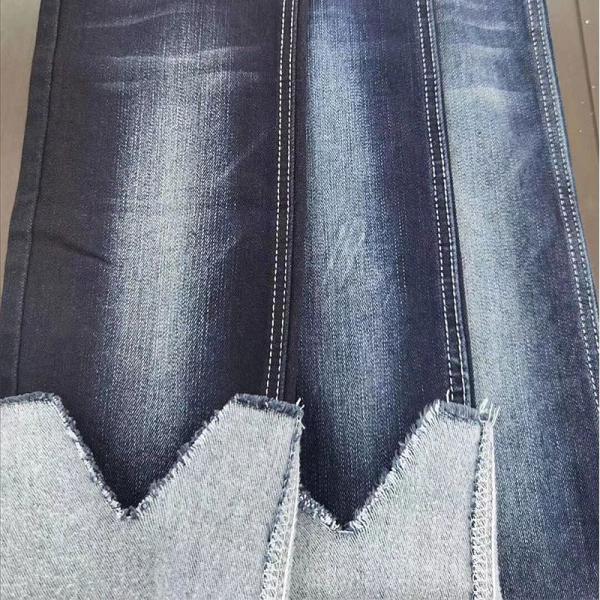 El agujero del vintage rasgó la tela lavada del dril de algodón de Spandex del poliéster del algodón