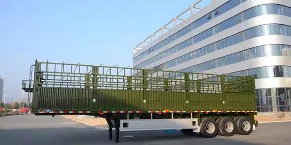 12400*2500*2000mm Curb Weight 7T 3 Axle 10pcs Leaf Spring 40T Payload Stake Semi Trailer