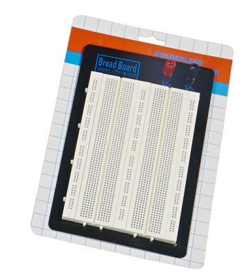 O laço 1580 aponta a placa de circuito da tábua de pão de Solderless