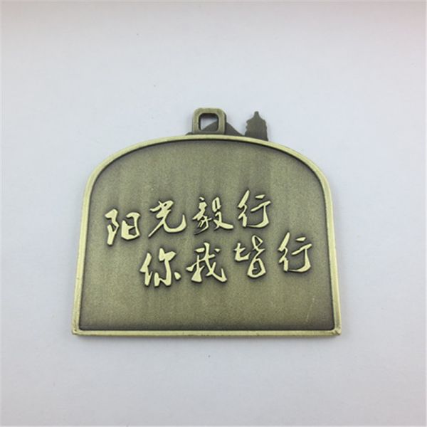 A fish shaped running medals,special design medals from China Customized
