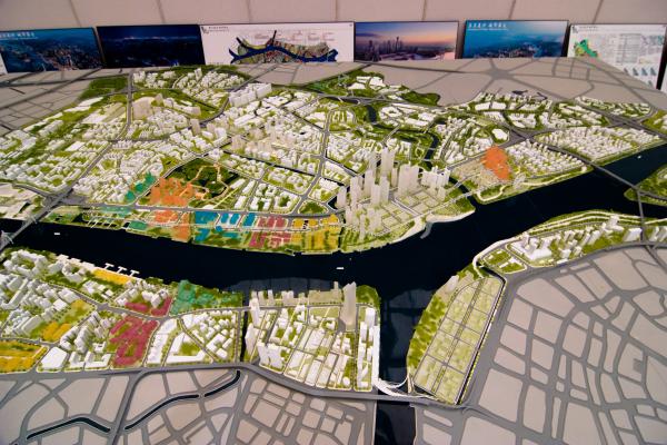 Architectural model urban block layout with mixed-use buildings, detailed green spaces and traffic planning