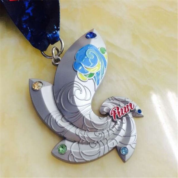 A fish shaped running medals,special design medals from China Customized