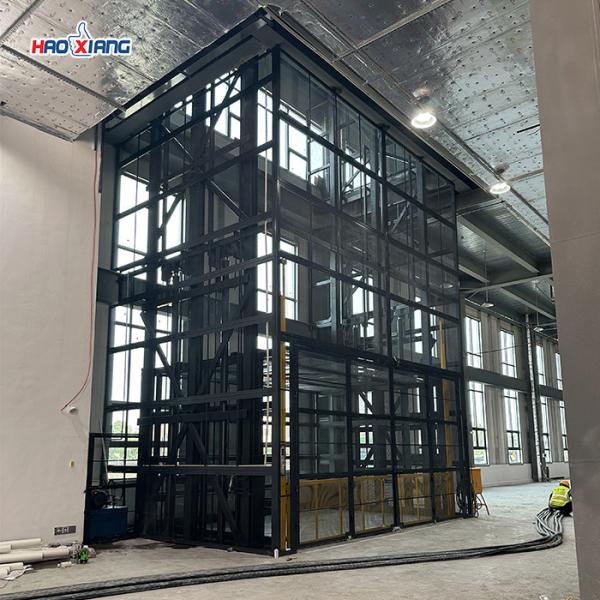 2-Story Hydraulic Freight Lift - 4 Ton Capacity, Anti-Fall Protection, Customizable Platform
