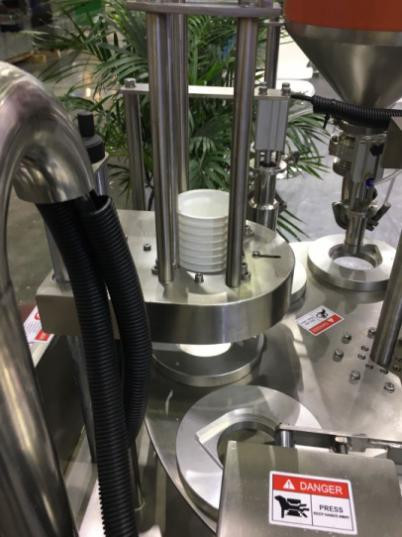 Automatic Viscous Liquid Rotary Cup Filling And Sealing Machine with PLC Control