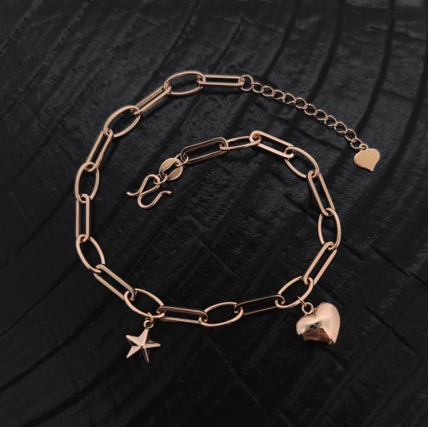925 sliver bracelets wiht heart and star chain .