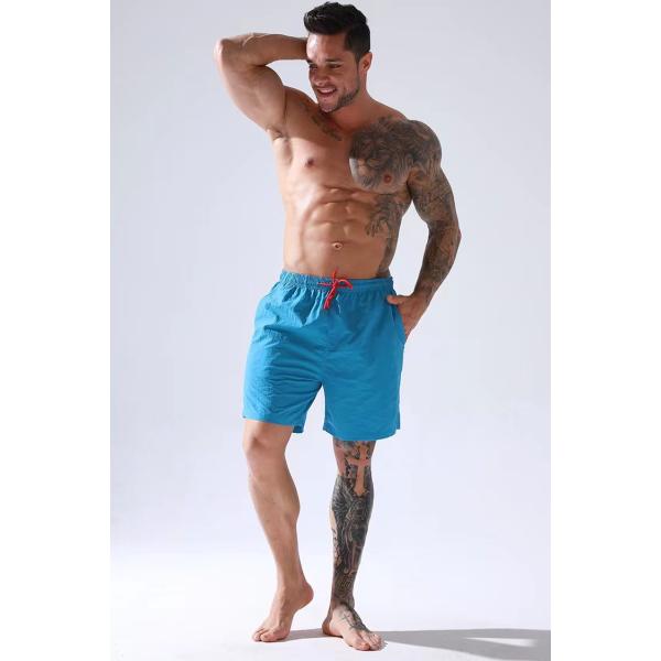 Swimwear людей сплошного цвета замыкает накоротко водоустойчивую носку пляжа шортов заплыва для людей