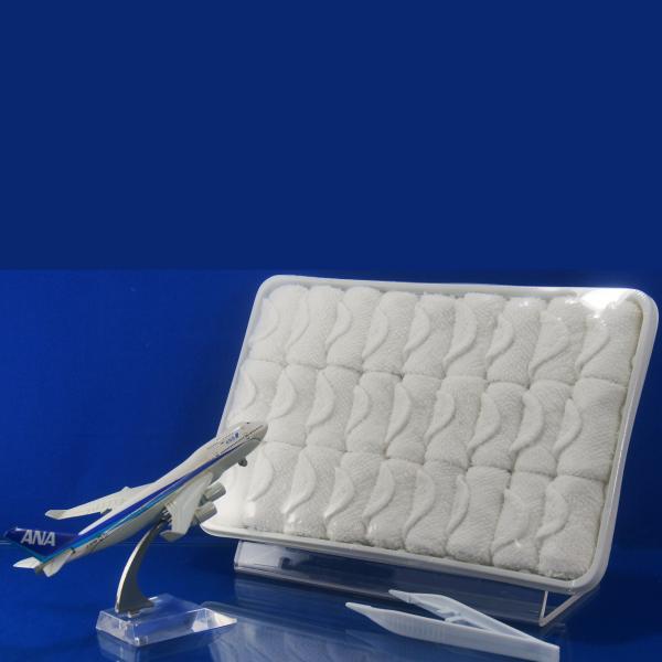 Полотенце белой устранимой авиакомпании горячее и холодное