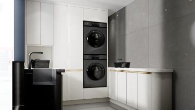 Modern Clean U-Shaped Custom Made Laundry Cabinets With White Paneling And Gold Accents