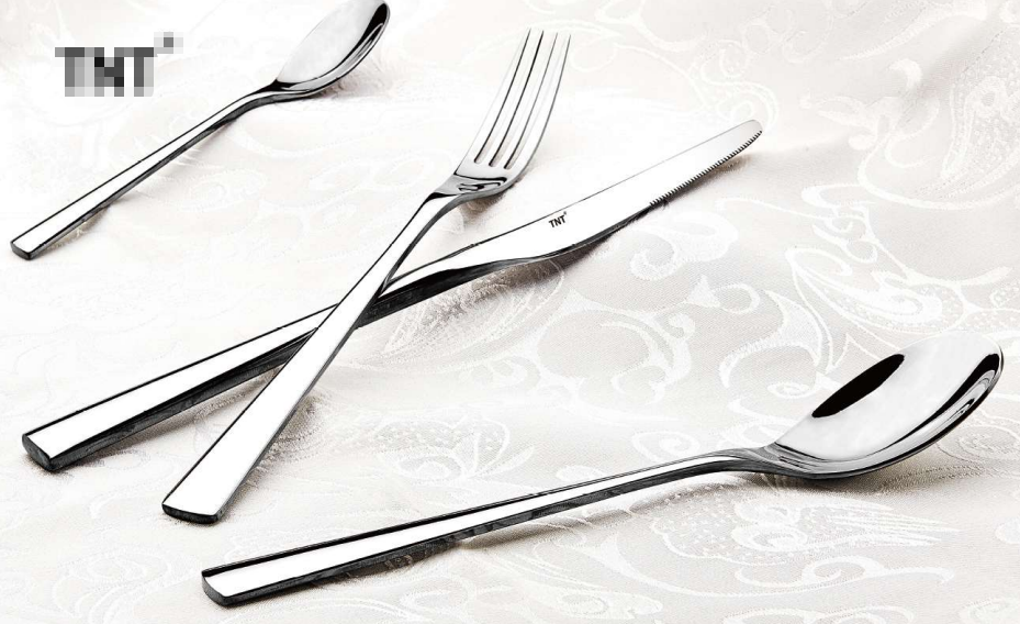 Polished stainless steel dining table ergonomic design durable construction perfect for commercial kitchens and restaurants