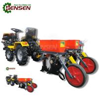 Tracteurs rouges compacts à quatre roues motrices avec semeur de maïs 4x4 mini tracteur