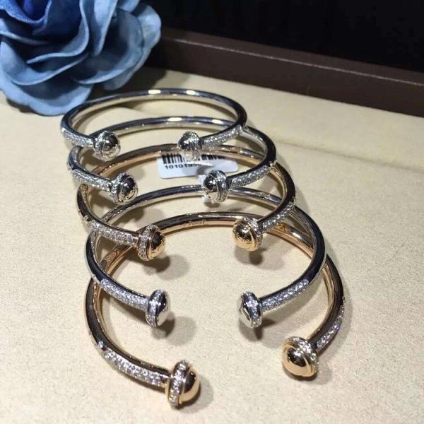 PIAGET  brand  jewelry 18k gold Possession open bangle bracelet set with 90 brilliant-cut diamonds (approx. 1.00 ct).