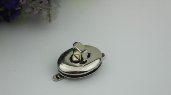 High quality small oval shape metal handbag accessories gold twist turn lock