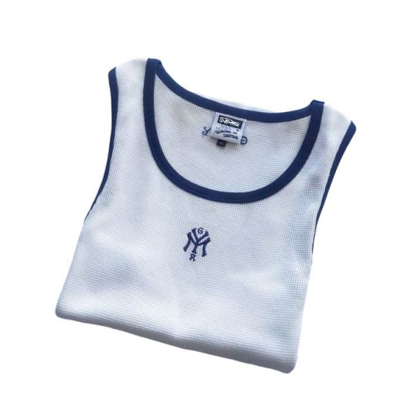 Mens tanktop featuring 100 percent cotton waffle fabric body solid color with contrast color rib piping around neck and armhole